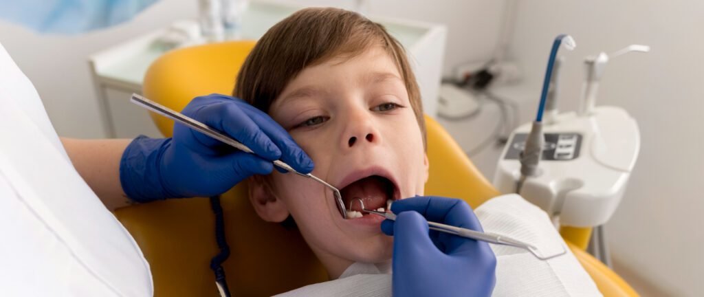 Child's molar with stainless steel crown after pulpotomy.